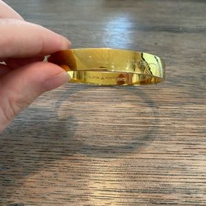 Kate spade gold bangle.